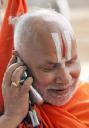 Sadhu with a mobile phone