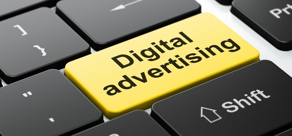 Advertising concept: Digital Advertising on keyboard background