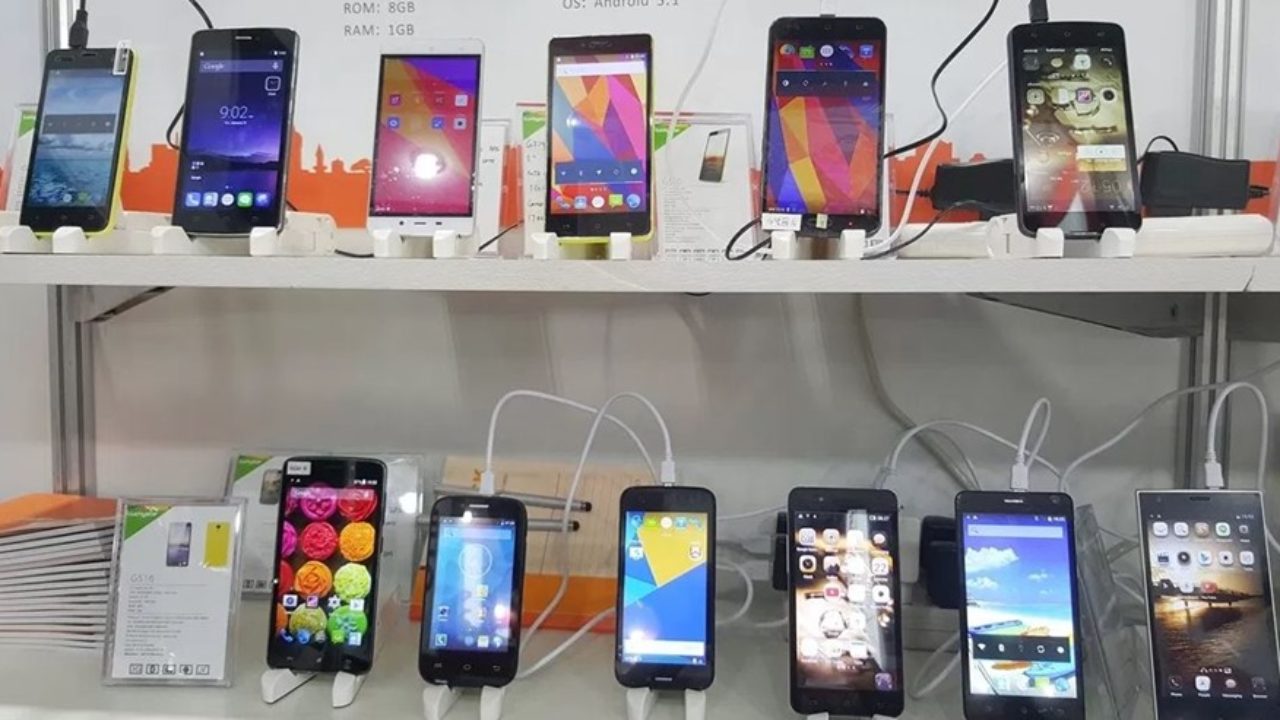 A selection of smartphones on display in a store