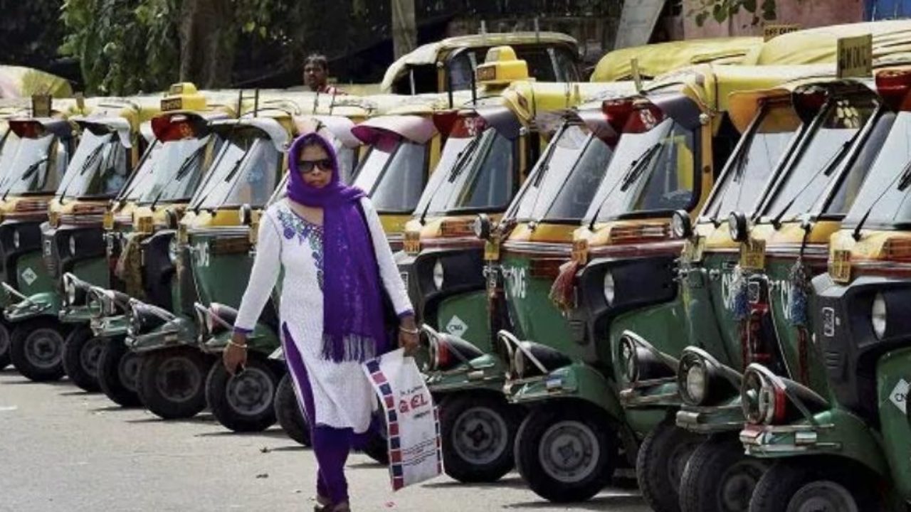 Auto rickshaws parked on roadside