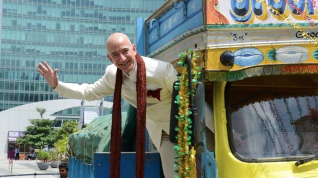 Jeff Bezos aboard a truck in India