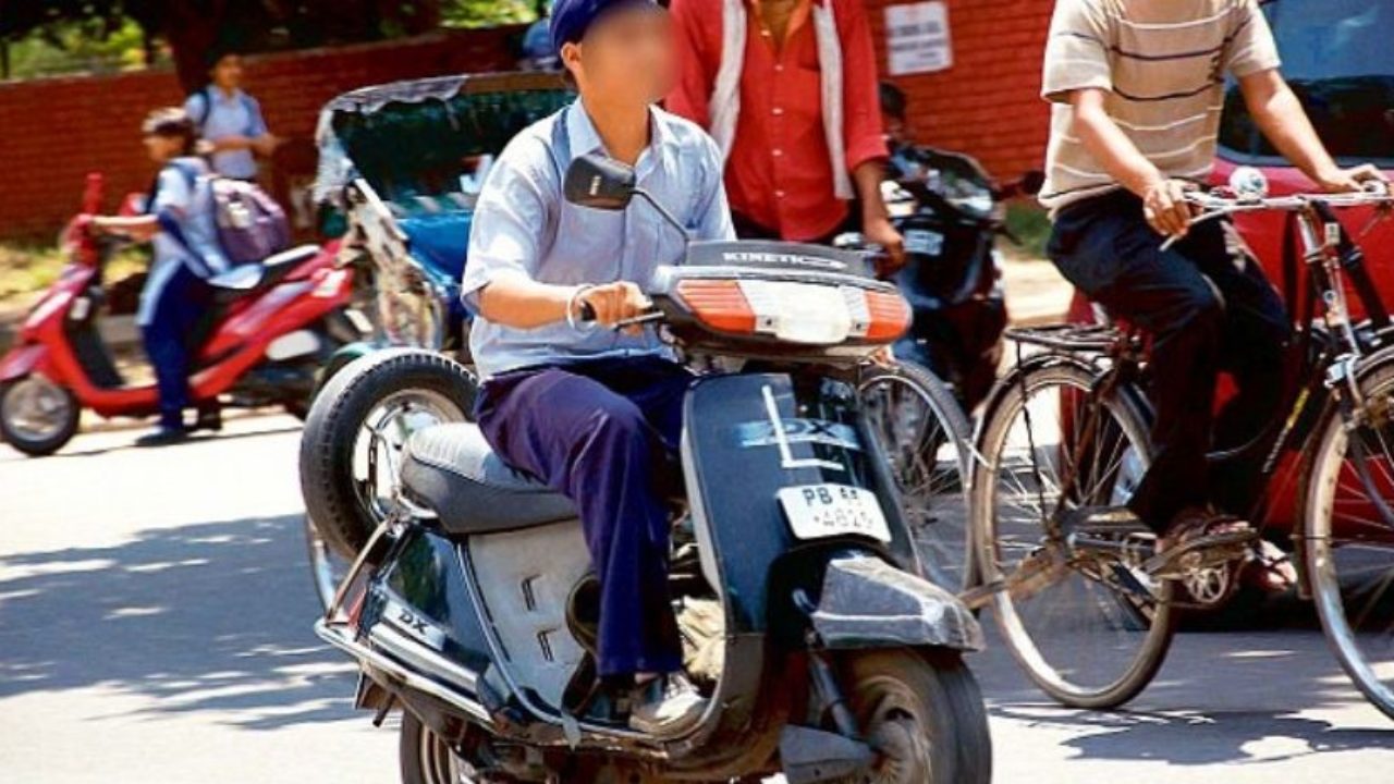 People riding two-wheelers