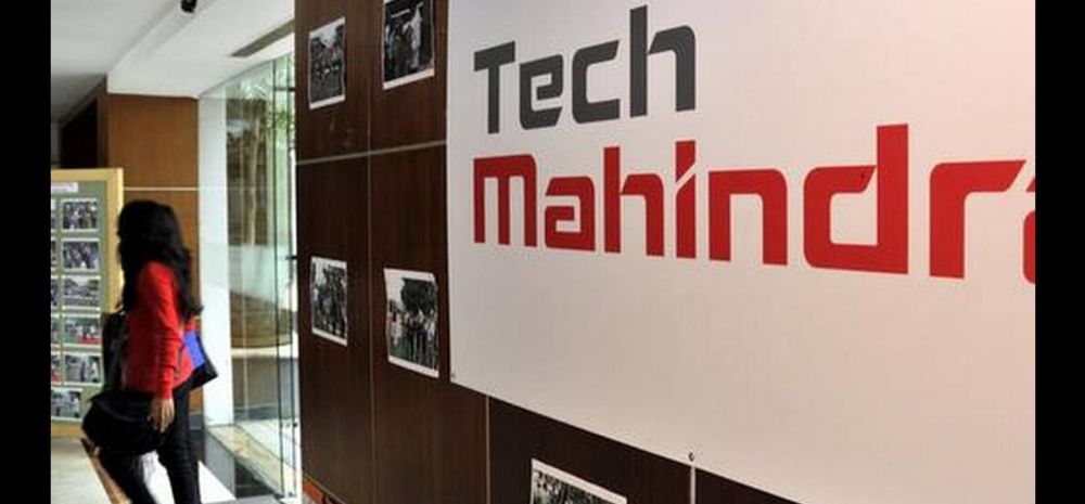 Tech Mahindra banner on a wall