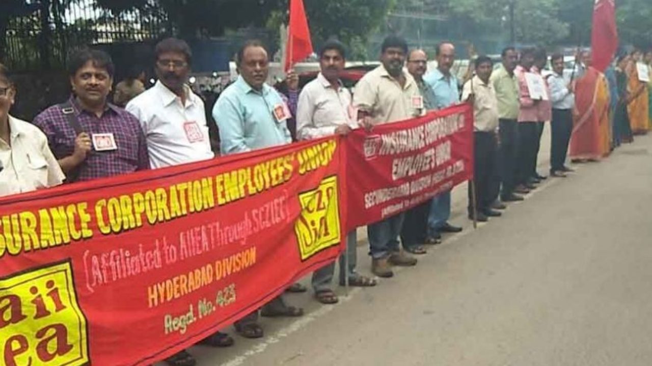 Insurance Corporation Employees Union of India participate in a strike