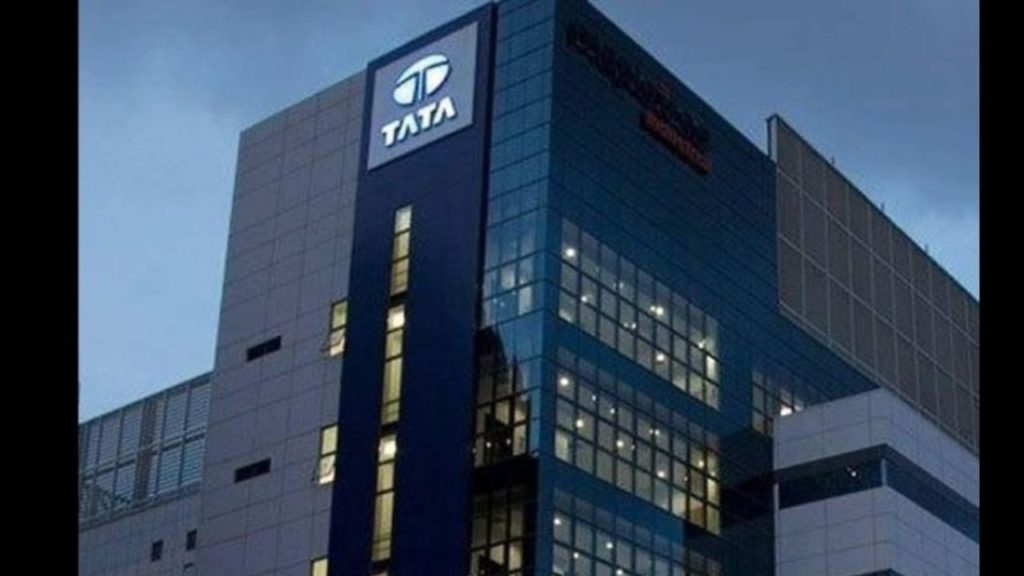 Tata logo illuminated outside a building