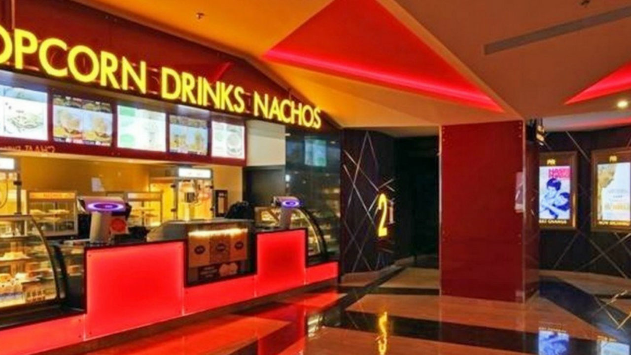 A food and drink kiosk inside a movie theatre