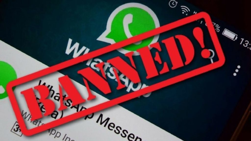 A red banner over Whatsapp home page reading BANNED!