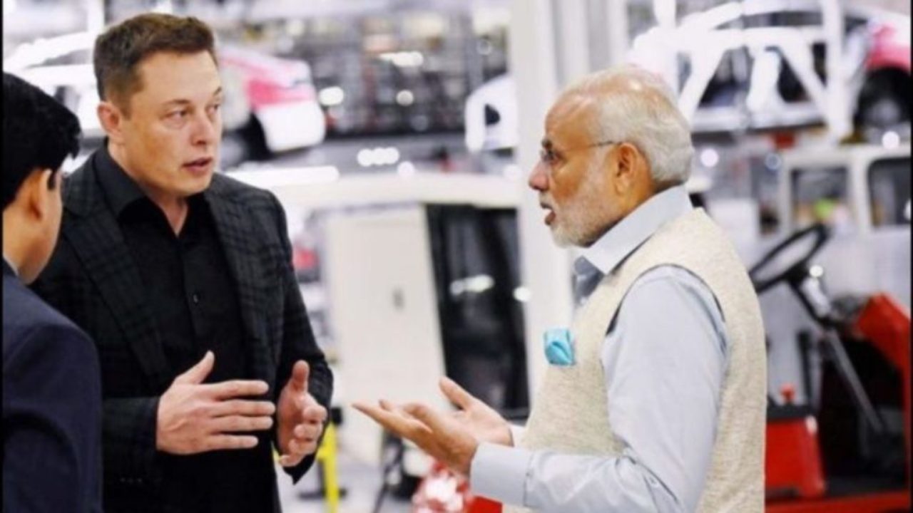 Elon Musk conversing with Narendra Modi