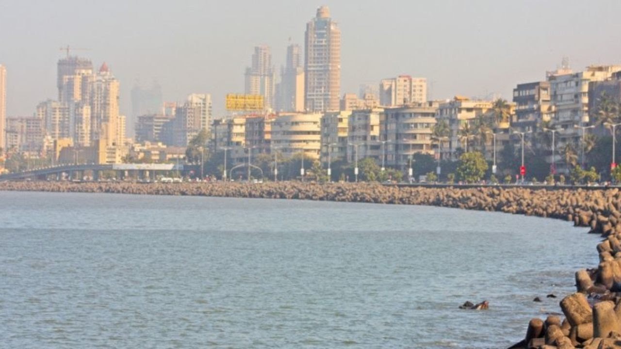 Mumbai skyline visible from beach